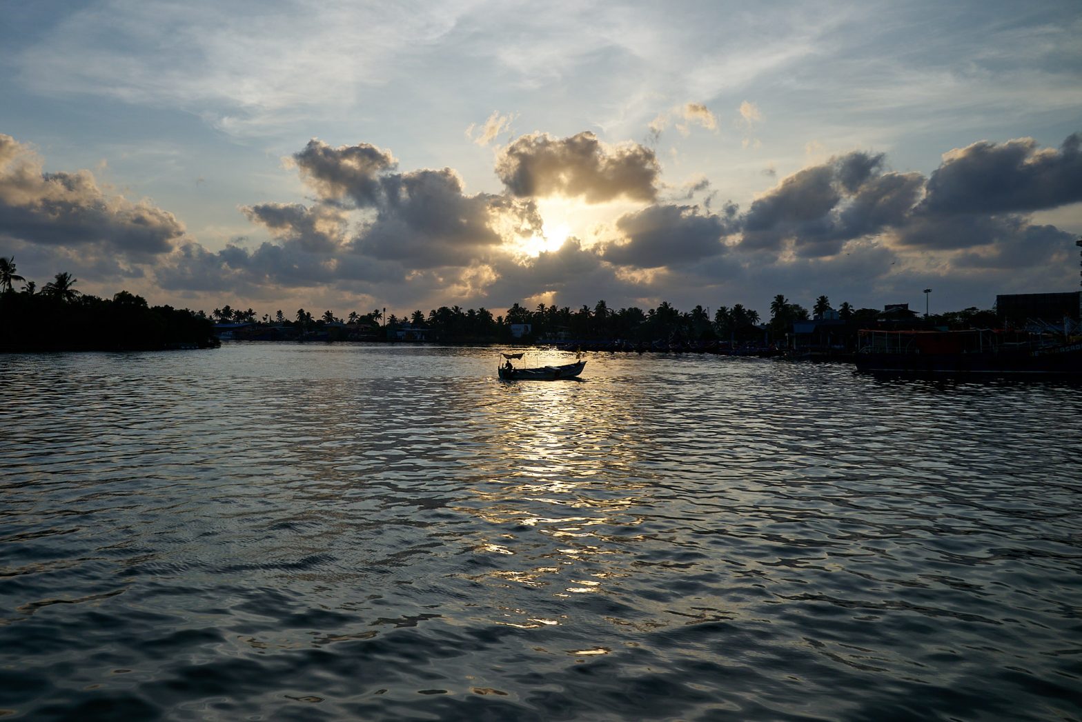Sunset on the shores of Vembanad Lake
